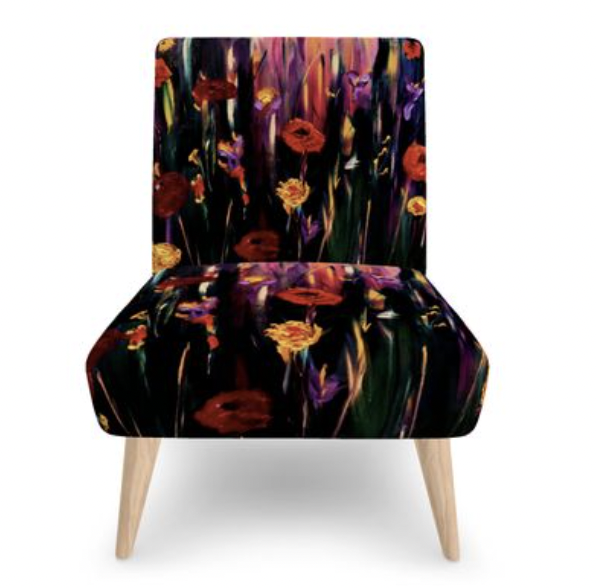 Poppies occasional chair featuring a vibrant floral print with bold red and orange poppies, colourful botanical details and rich artistic tones, creating a striking statement piece for the home.
