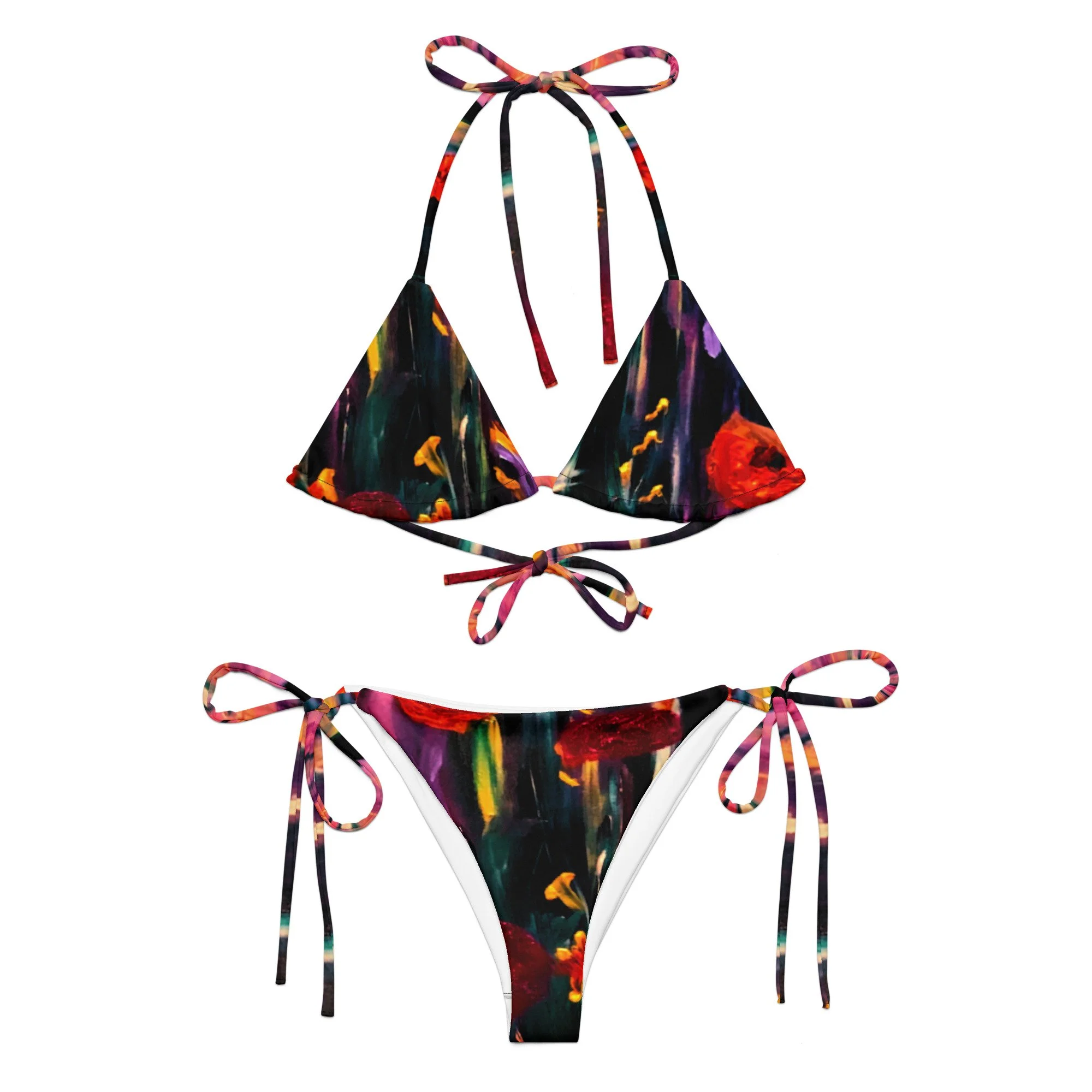 Women’s string bikini featuring a vibrant poppy floral print, with bold red flowers and artistic botanical detailing for a colourful, feminine swimwear look.