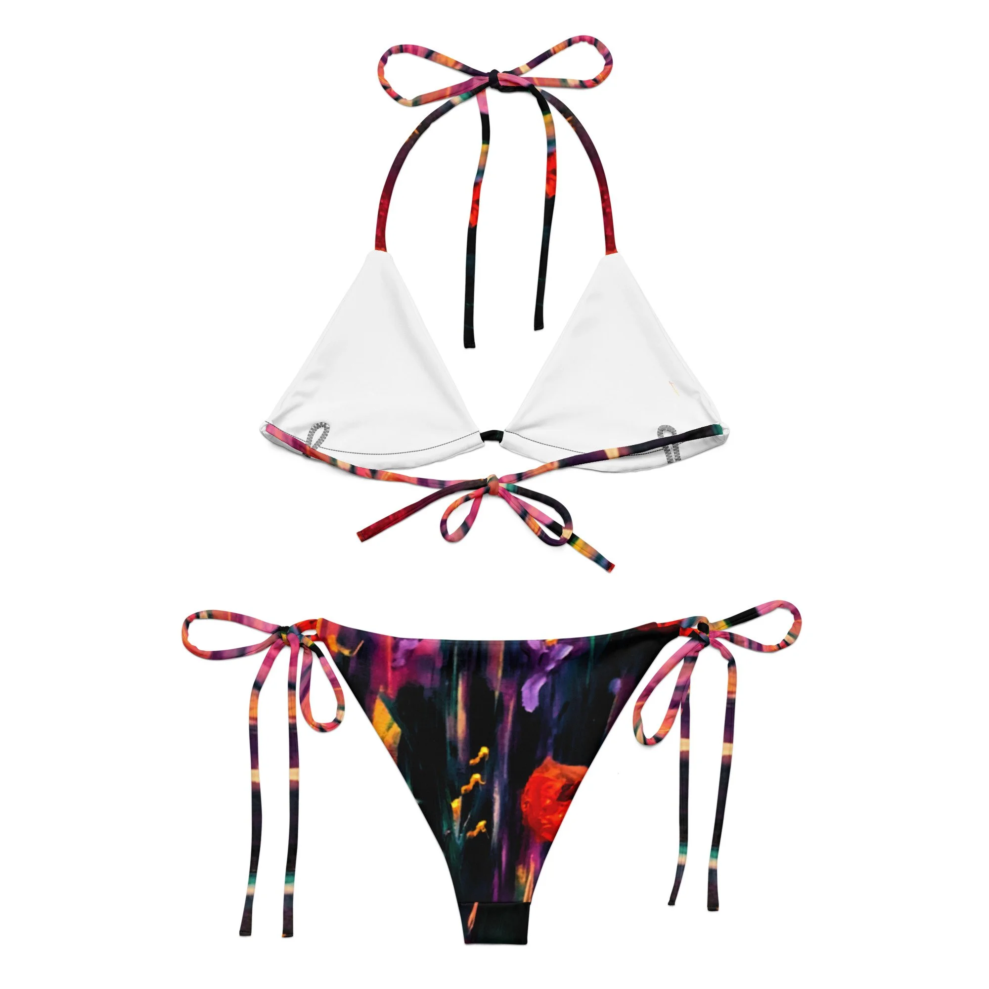 Women’s string bikini featuring a vibrant poppy floral print, with bold red flowers and artistic botanical detailing for a colourful, feminine swimwear look.