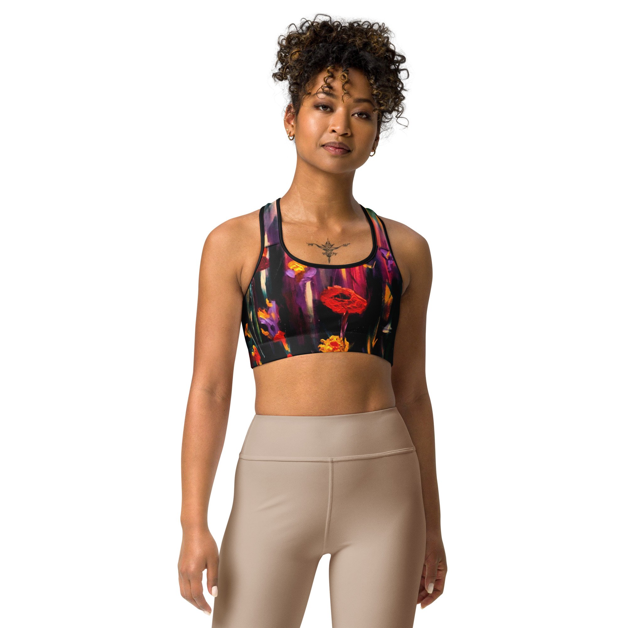 Women’s sports bra featuring a vibrant poppy floral print, combining bold botanical artwork with a comfortable, supportive athletic design for active and everyday wear.