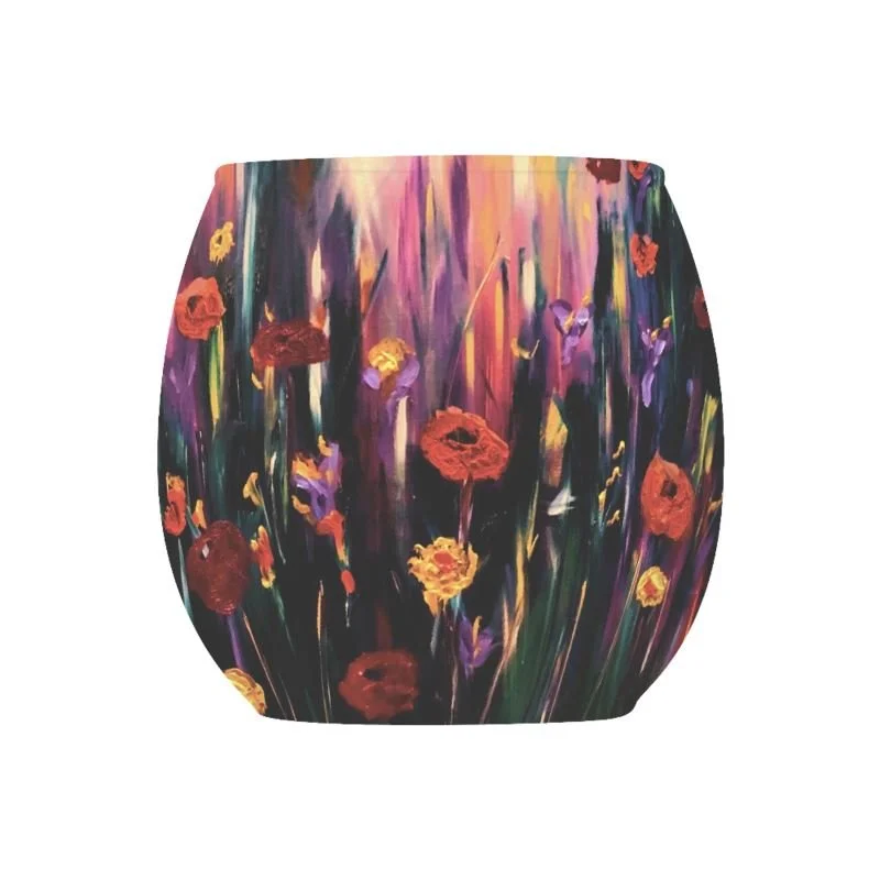 Glass tealight candle holder featuring vibrant poppy artwork with bold red and golden flowers, purple blooms and rich expressive colours.