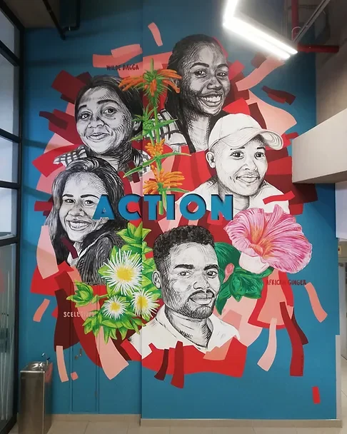 Colorful mural featuring five black and white portraits of diverse people, with vibrant flowers and leaves, and the word "ACTION" in large blue letters at the center.