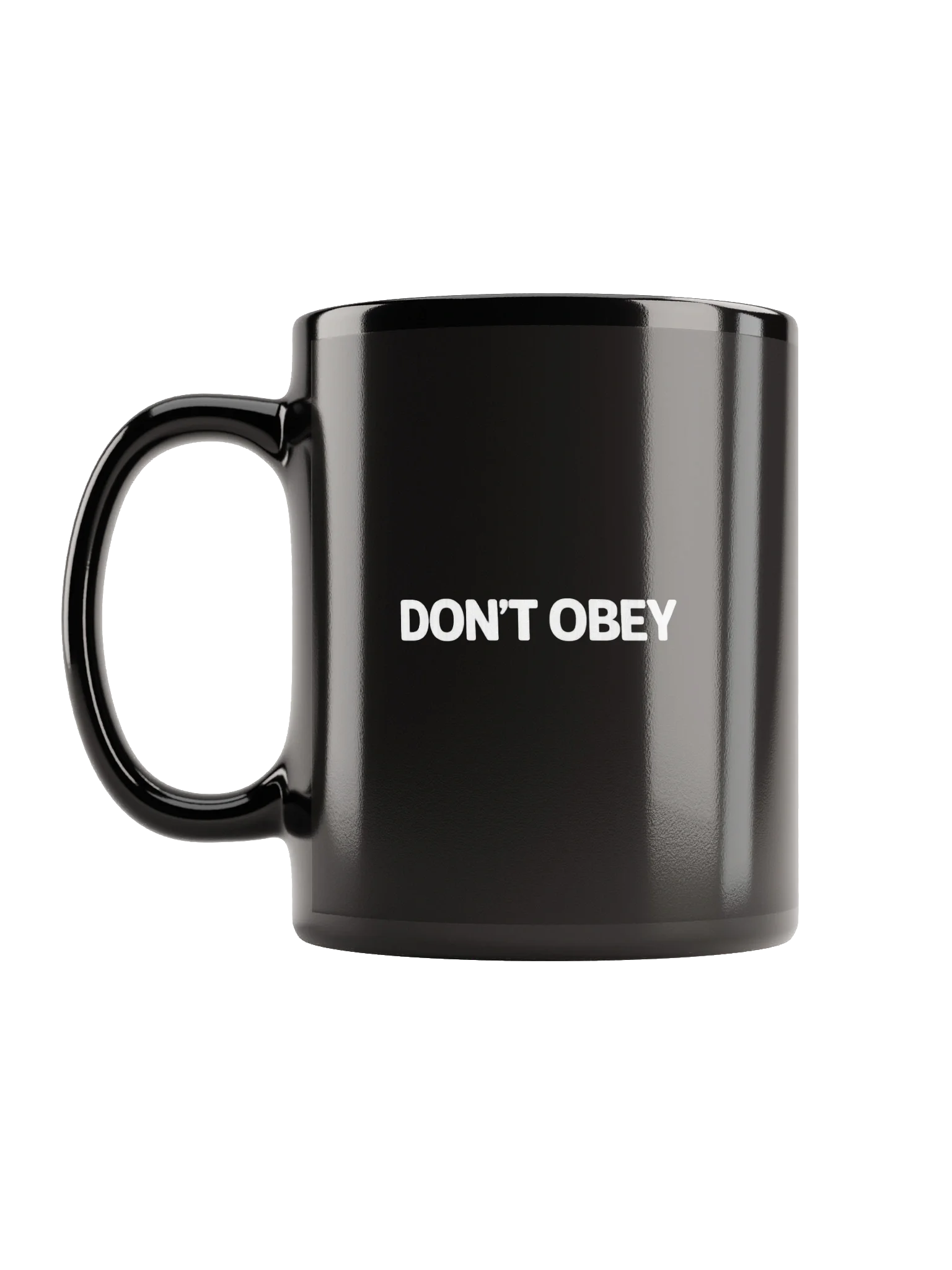 Black ceramic coffee mug with white text that says "DON'T OBEY" on its side.