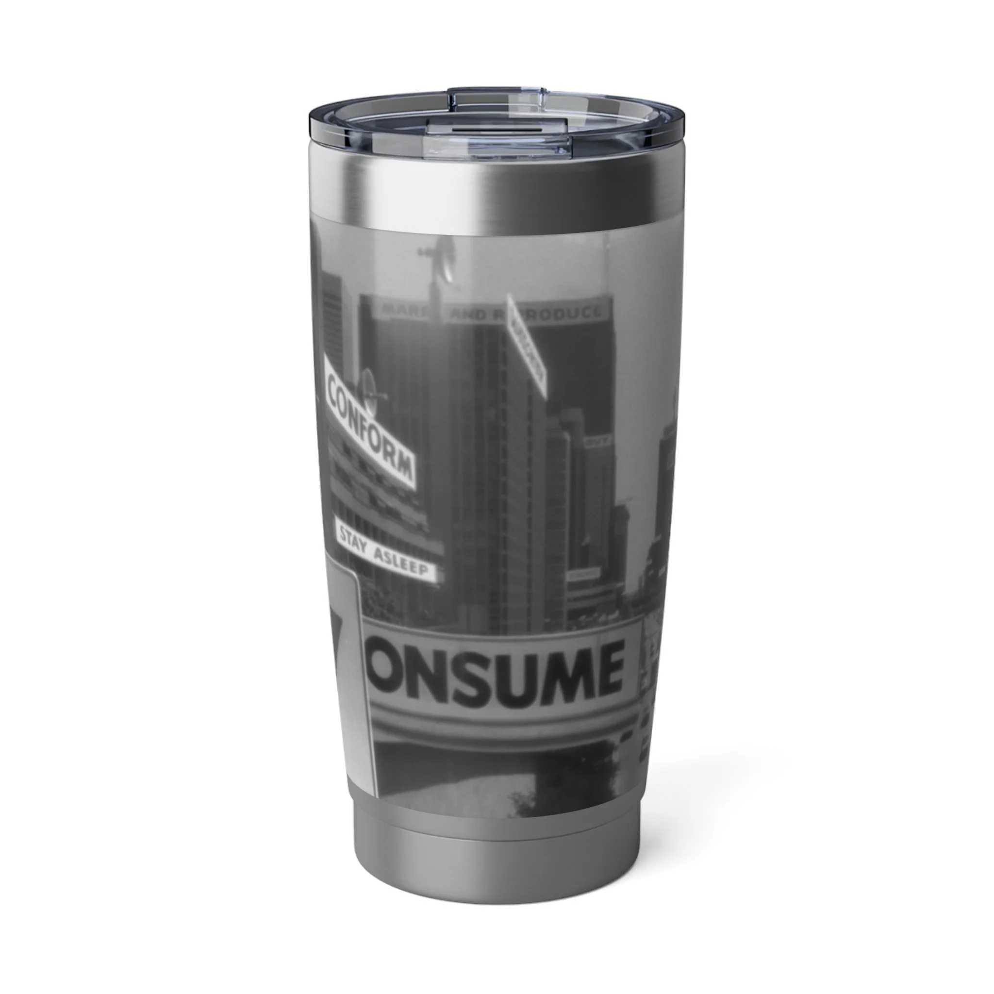 A tall reusable travel tumbler with city buildings and graffiti-style text, featuring words like "CONFORM," "STAY ASLEEP," and "CONSUME."