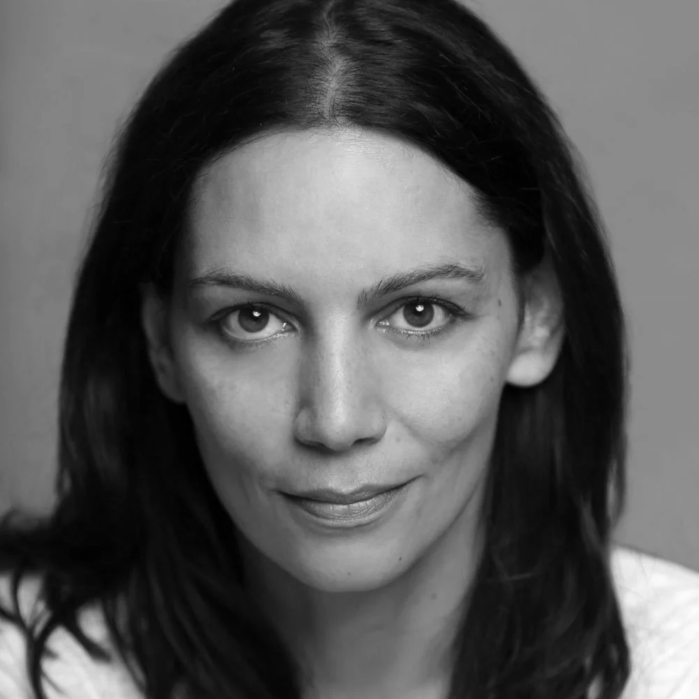 a black and white photo of Sasha Behar, leadership coach at OMA.