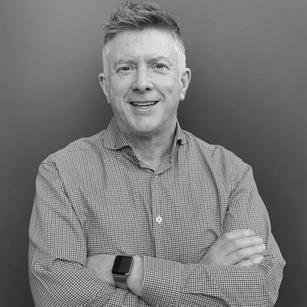 Black and white portrait of leadership coach Mike Irwin