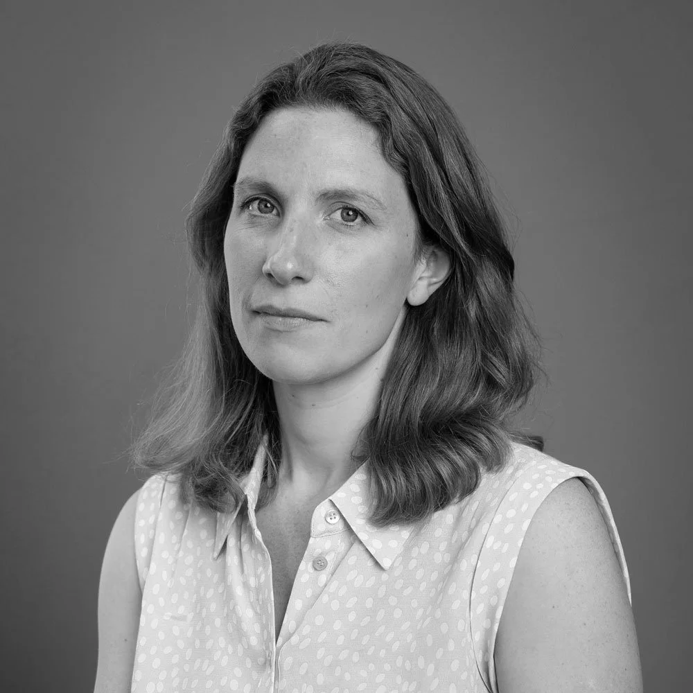 a black and white photo of Caroline Kilpatrick, leadership coach at OMA.