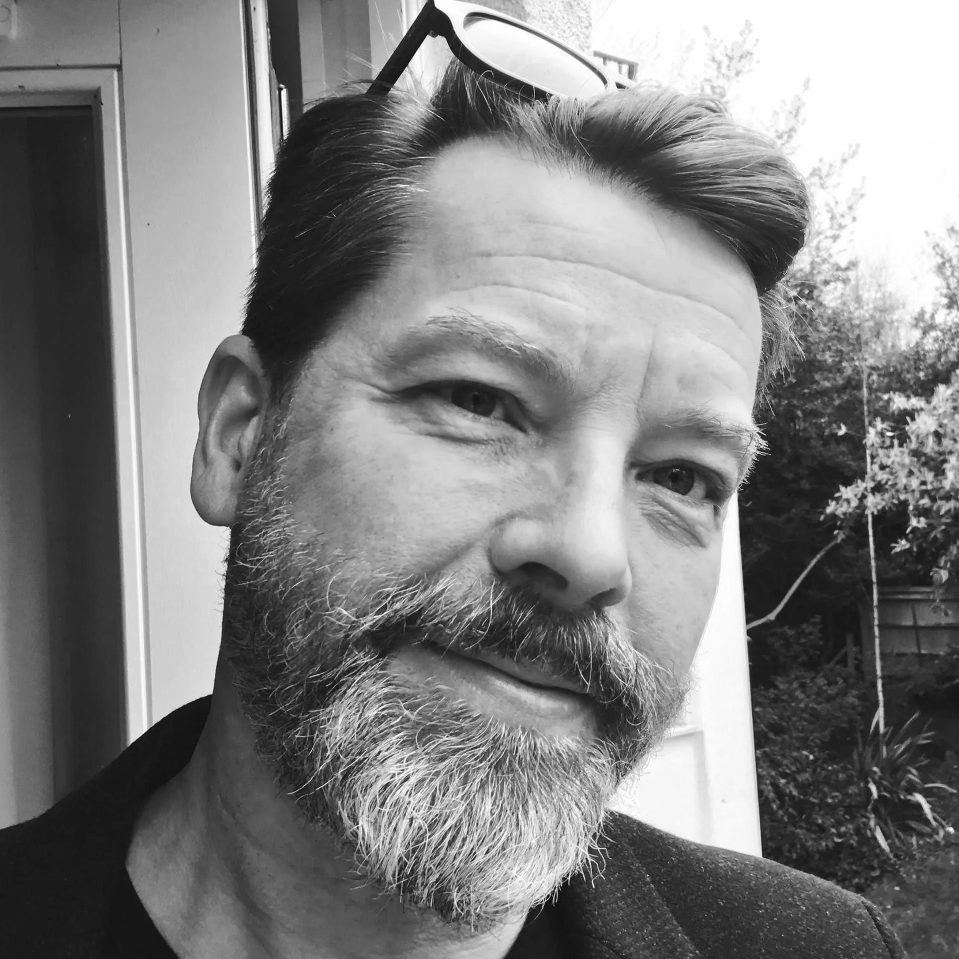 Black and white portrait of leadership coach Mark Swatkins