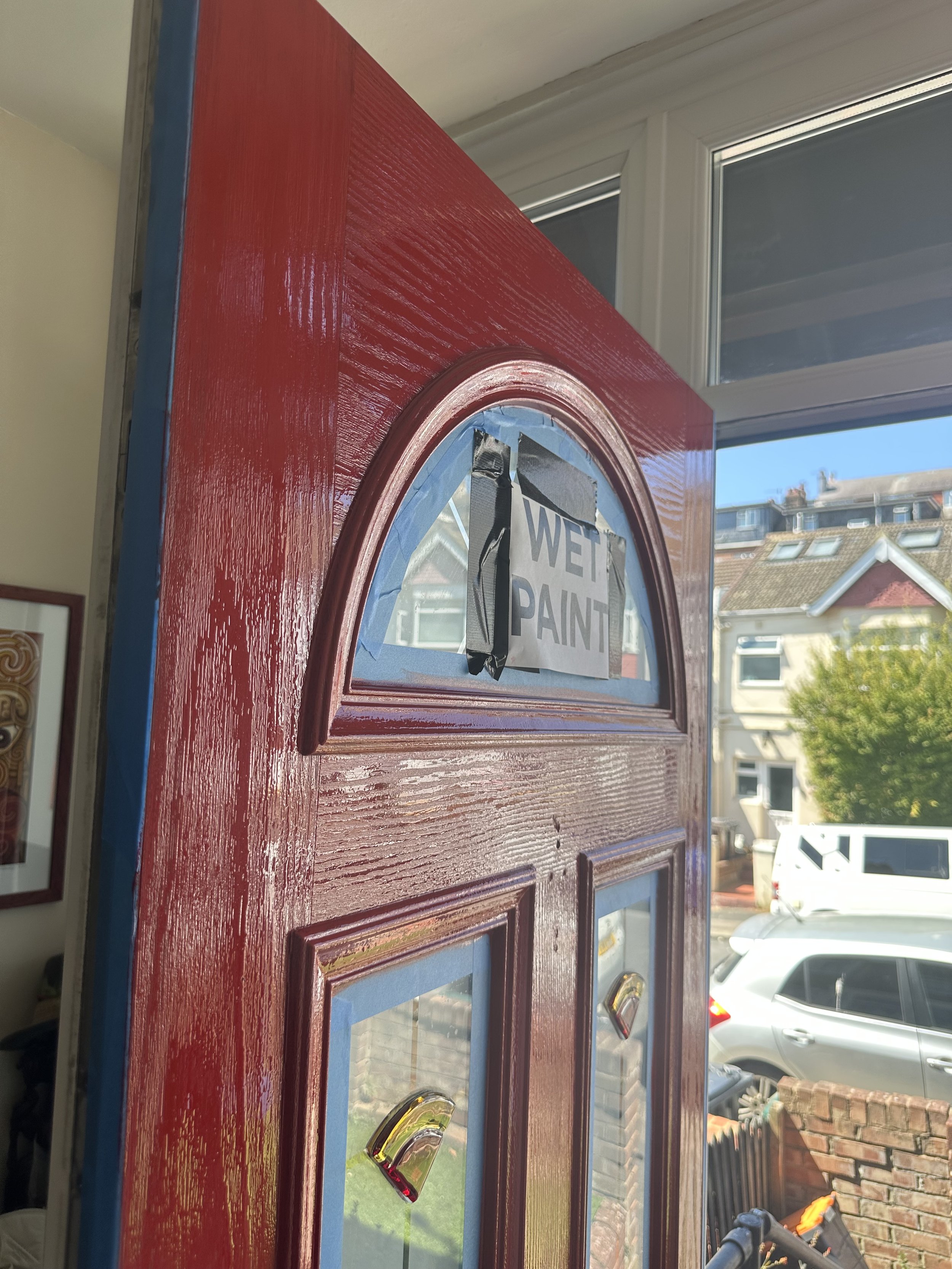 uPVC was previously white, and has been primed carefully and painted in Zinsser All-Coat Oil Gloss. The windows have been protected with blue tape and the metalwork has been removed so a clean finish could be acheived. 