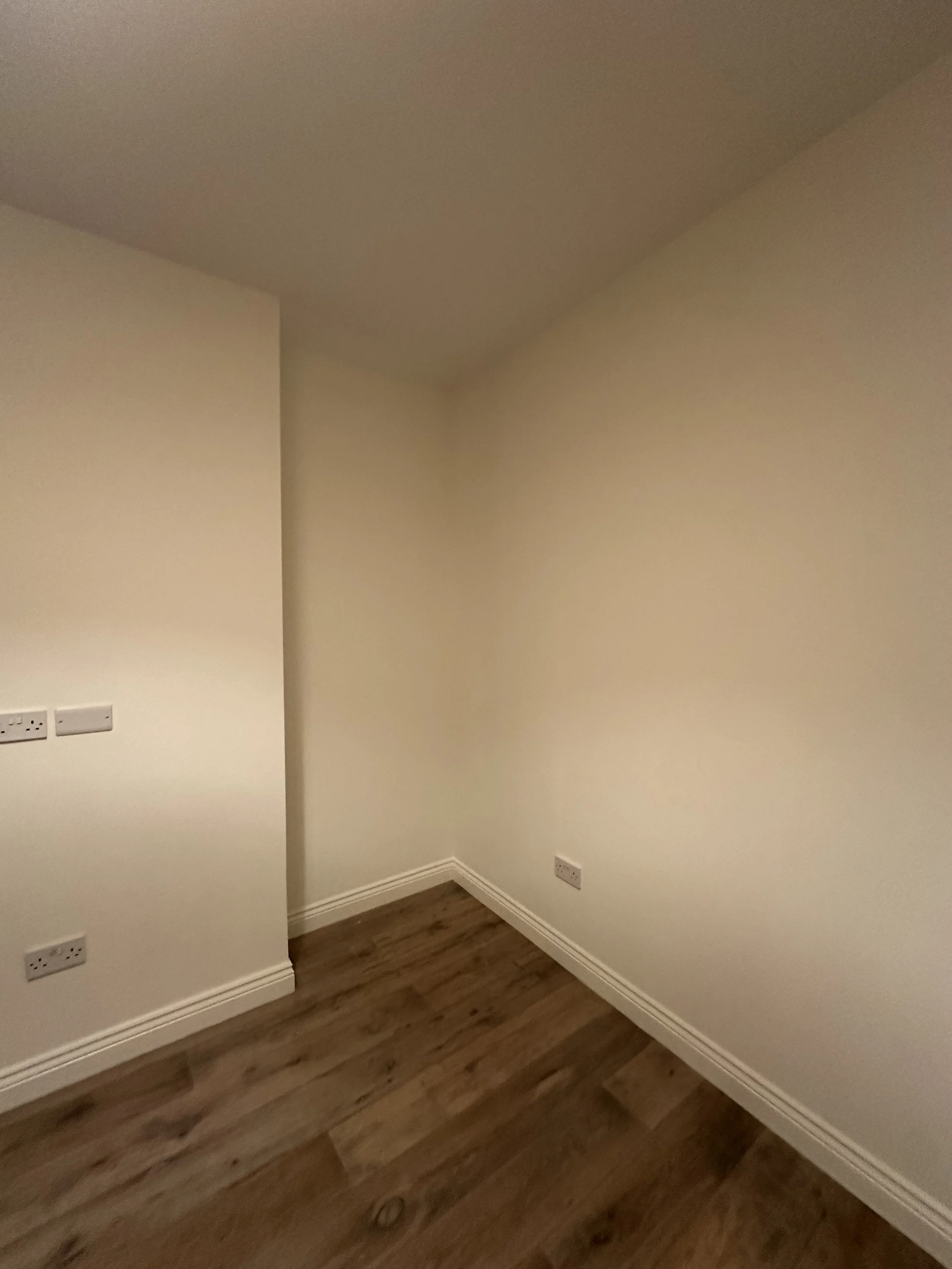 A previously very worn bedroom, fully repaired and painted in Johnstones CovaPlus Vinyl, woodwork in Johnstones Durable Eggshell. The ceiling was painted with two coats of Albany AF1. 