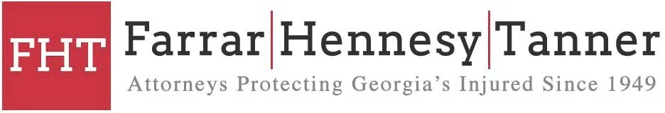 Logo with red background and white text reading 'FHT' on the left, and the names 'Farrar Hennessy Tanner' separated by vertical lines on the right, with the slogan 'Attorneys Protecting Georgia's Injured Since 1949' below.