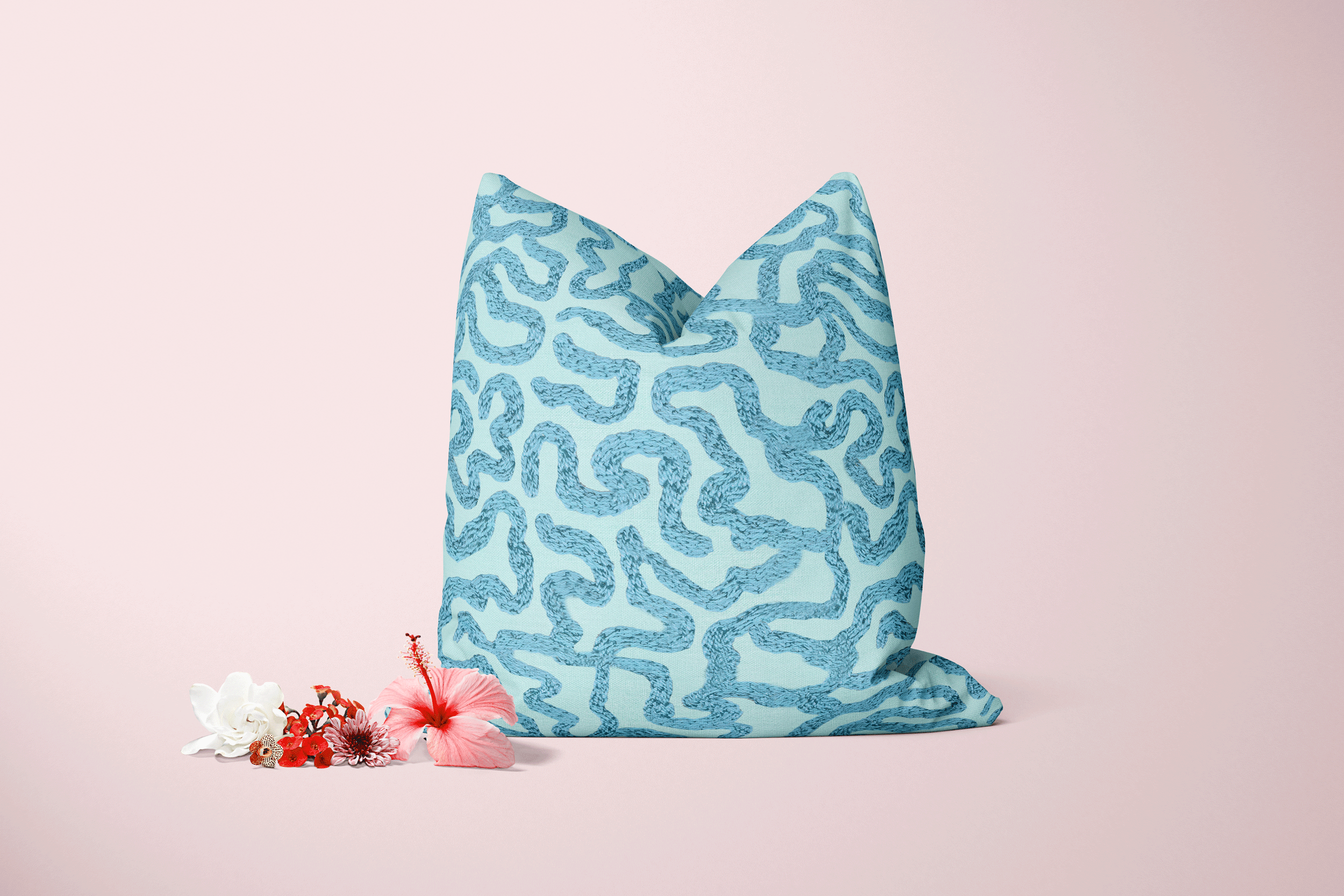 This hand embroidered motif resembles abstract coral reef formations and creates a modern coastal aesthetic. 