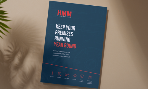 Brochure titled "Keep Your Premises Running Year Round" from HMM with icons related to maintenance and facilities on a desk