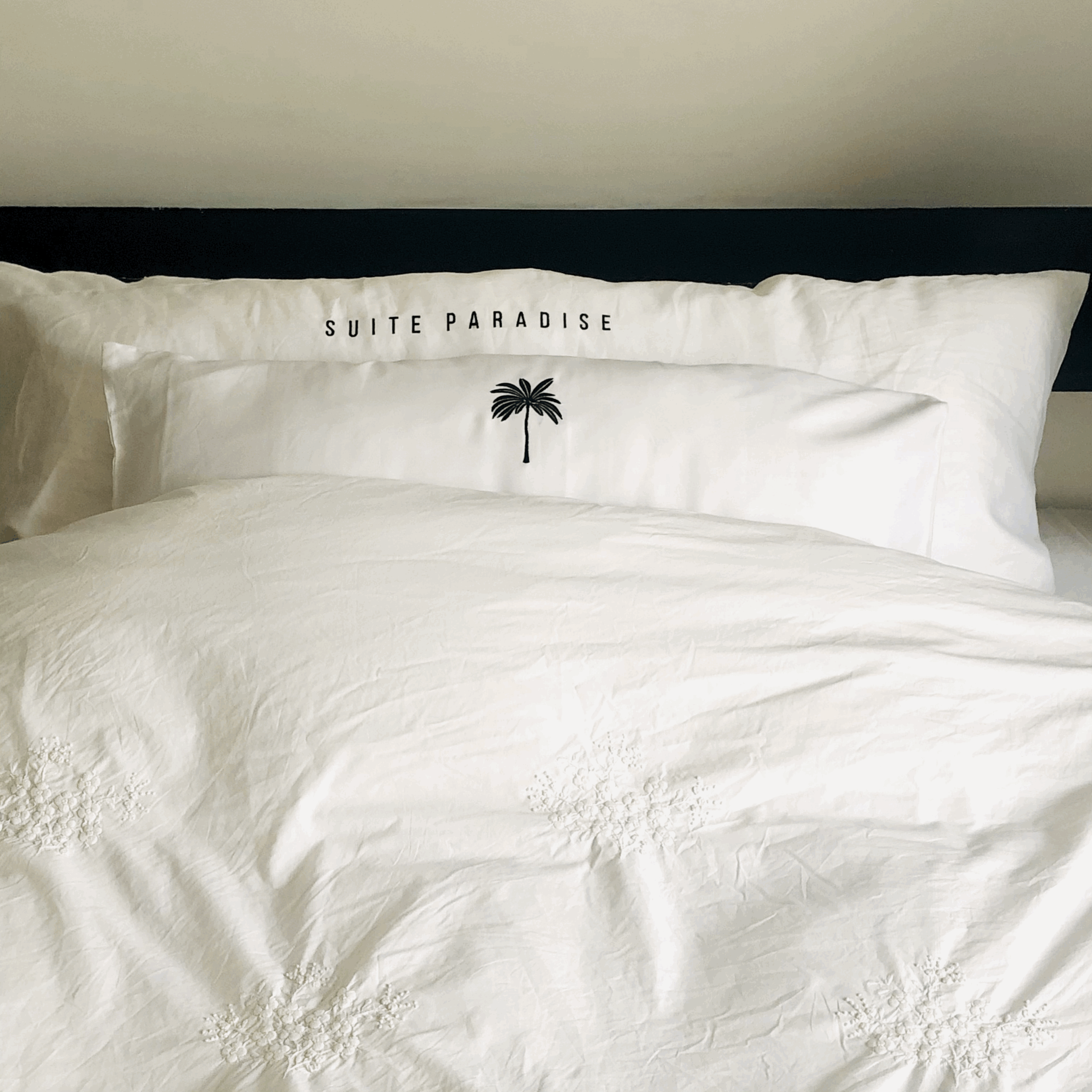 Suite Paradise x Douxe pillowcase set - with the iconic black palm