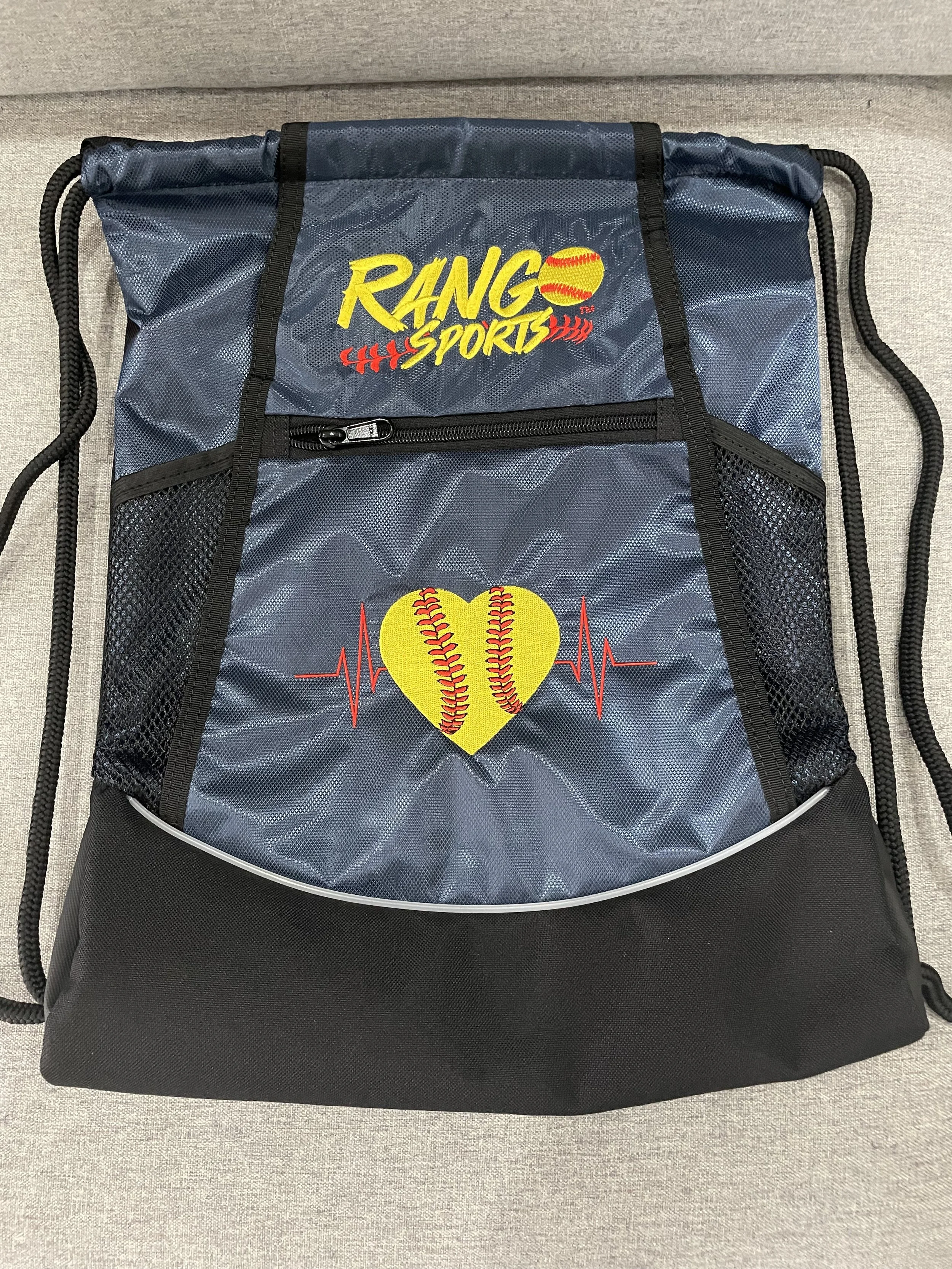 A sports backpack with a 'RANGO SPORTS' logo and a heart with a baseball and heartbeat line design on it.