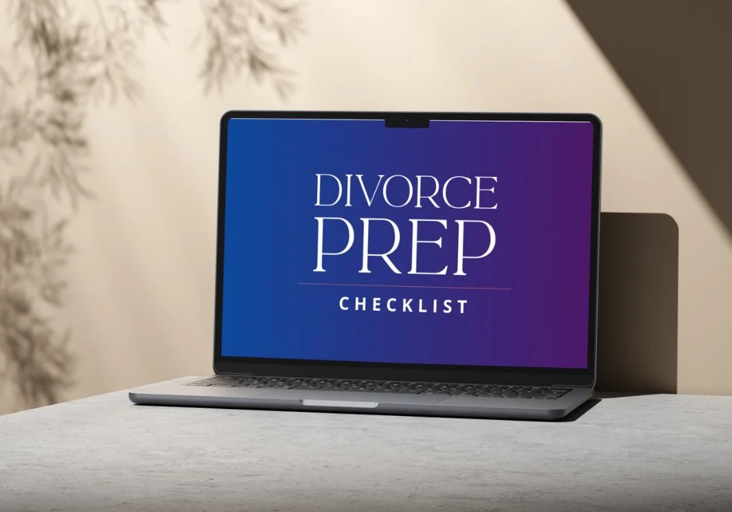 Laptop computer displaying a divorce prep checklist on the screen with a blurred background.