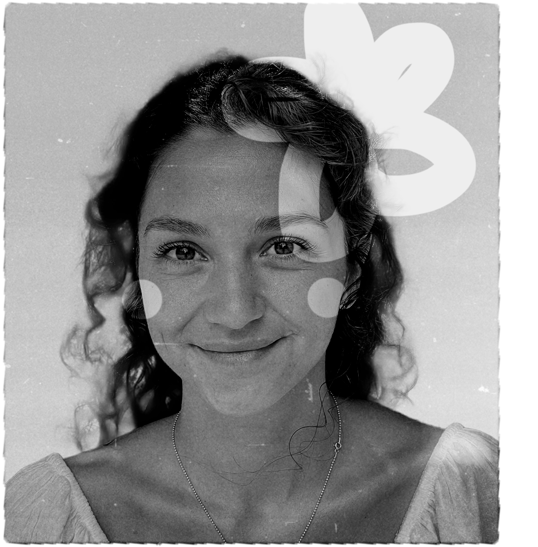Black-and-white portrait of a smiling woman with curly hair and light-colored top, smiling at the camera. Beef Design Studio, Brand strategy, Brand identity, visual identity, graphic design, testimonial.