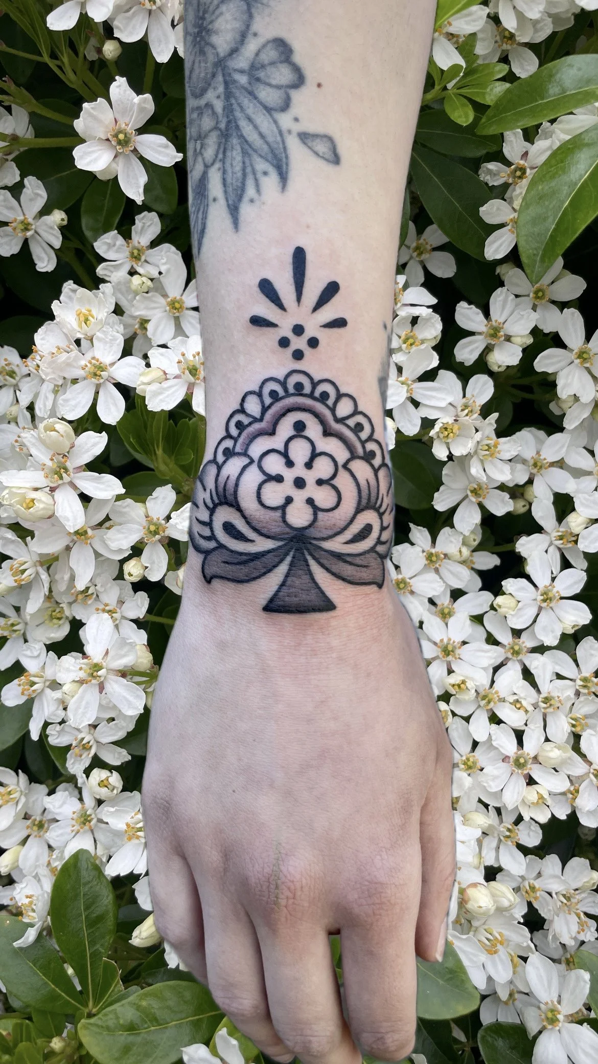 Wrist paisley floral ornament