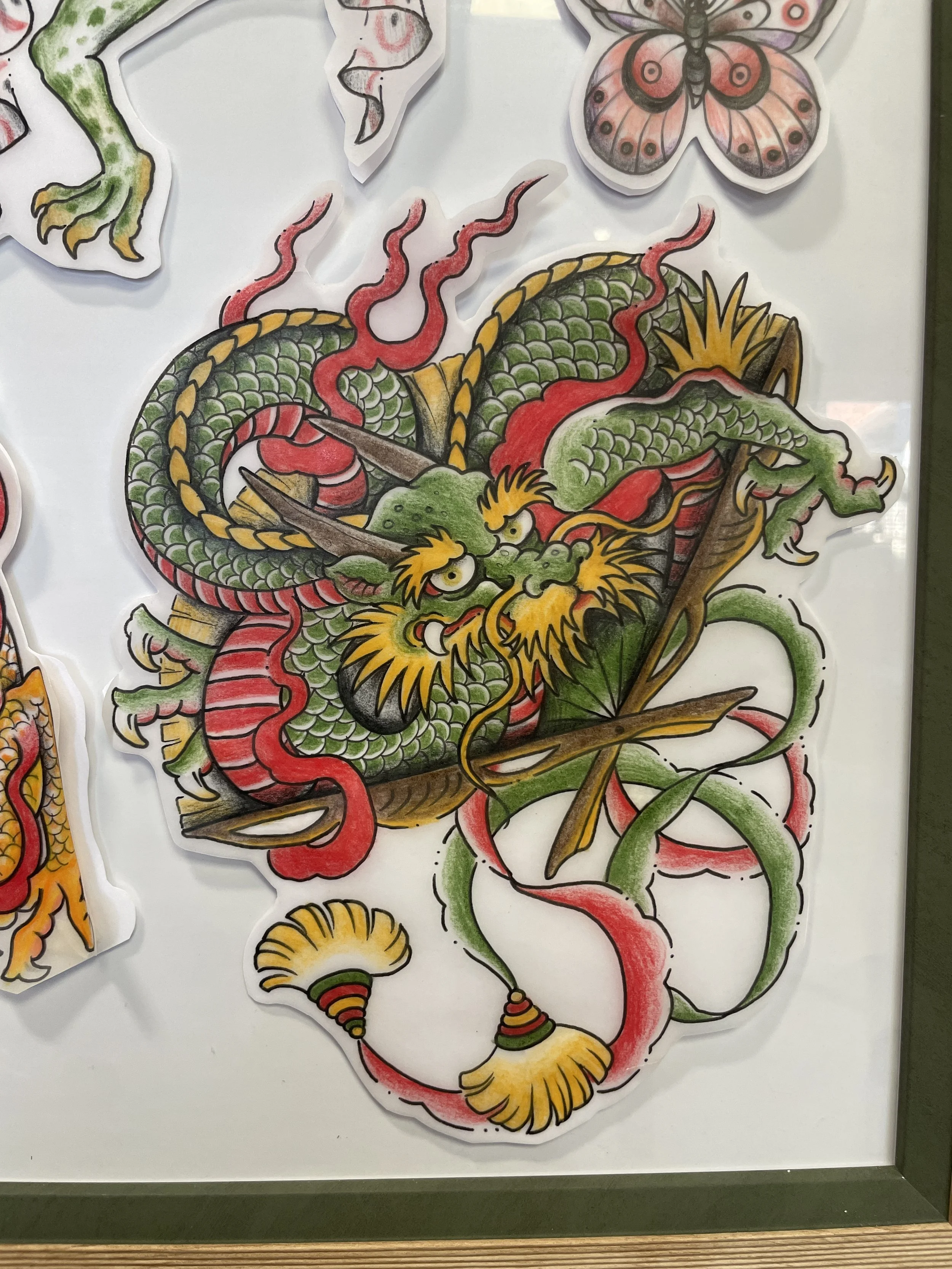 Colorful traditional tattoo design of a Chinese dragon.