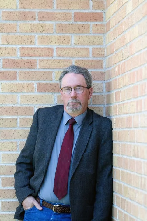 Portrait of Lorne Hadley, P.Ag., founder of AgGenuity, a Saskatchewan-based agriculture and seed consultancy.