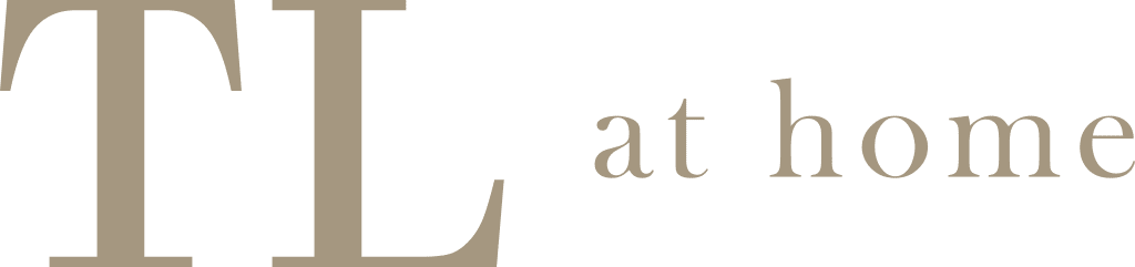 Text graphic with the words 'TILE at home' in large, elegant font.