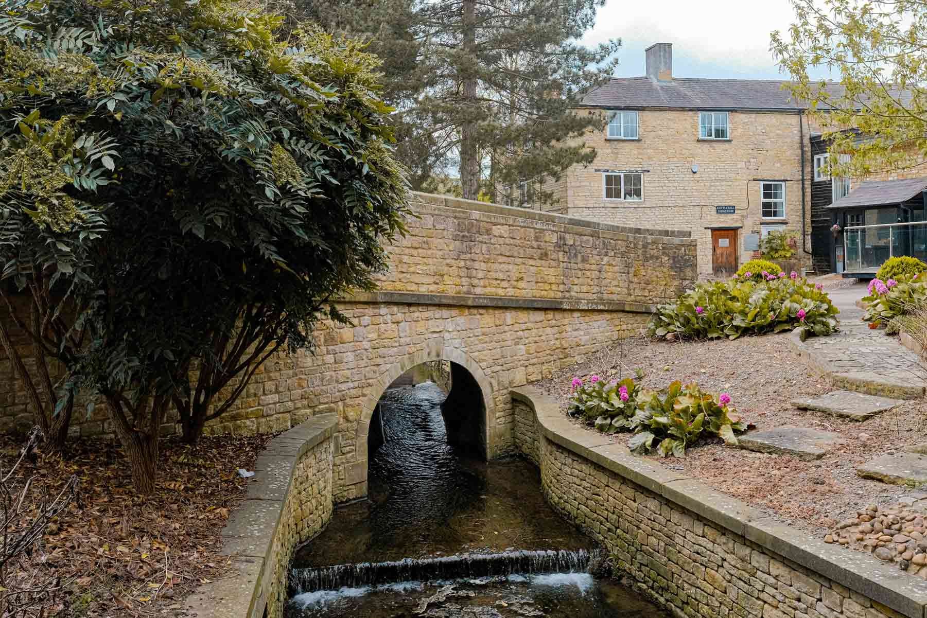 Cuttle Mill Training Room Hire Scenic Grounds with Pond and Bridge in Northampton