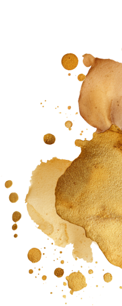 Spilled coffee and scattered cookie crumbs on a white surface