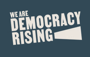 Text that reads 'WE ARE DEMOCRACY RISING' on a dark teal background.