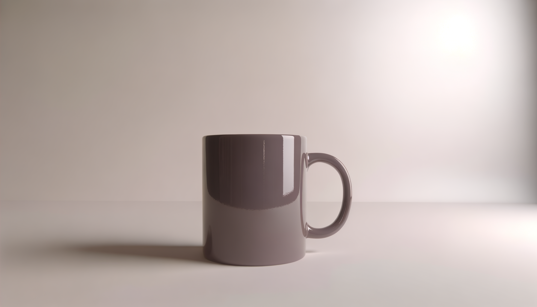 A plain ceramic mug on a white surface with a neutral background.