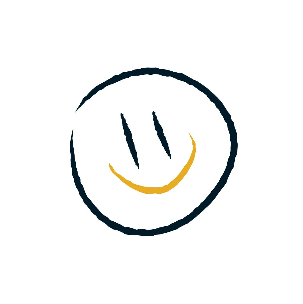 A simple hand-drawn smiling face with two vertical lines for eyes and a curved line for a smile, enclosed in a rough circular outline.