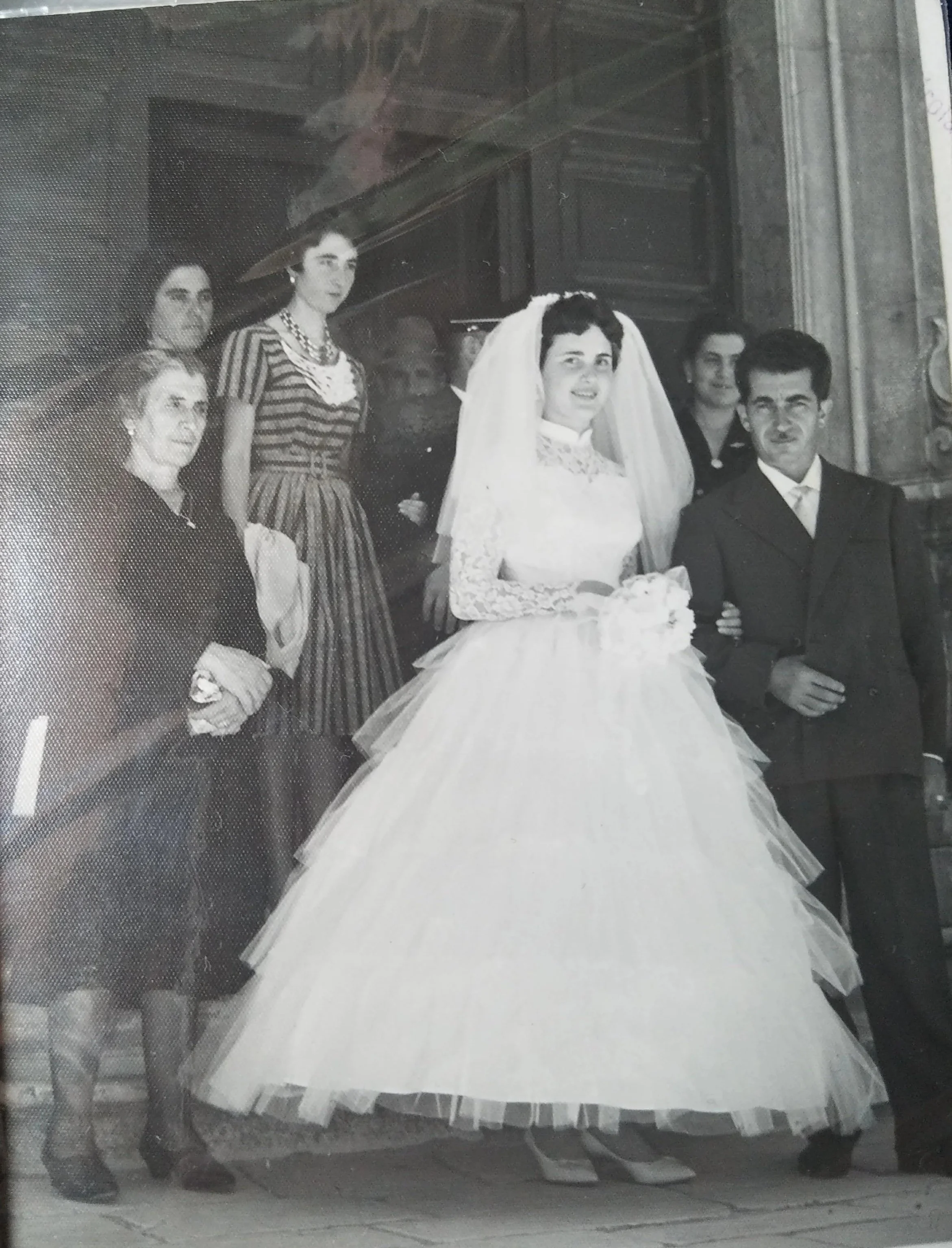 Antonietta's wedding by proxy, Italy. Left to right: Maria Michela, Carmela, Antonietta, Francesco Melega standing in for Antonio, Maria Giuseppa, Anna. Antonio was in Venezuela.