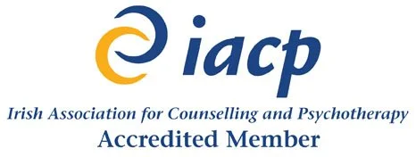 Logo of the Irish Association for Counselling and Psychotherapy (IACP) with a stylized 'e' symbol in blue and orange, alongside the text 'Irish Association for Counselling and Psychotherapy' and 'Accredited Member'.