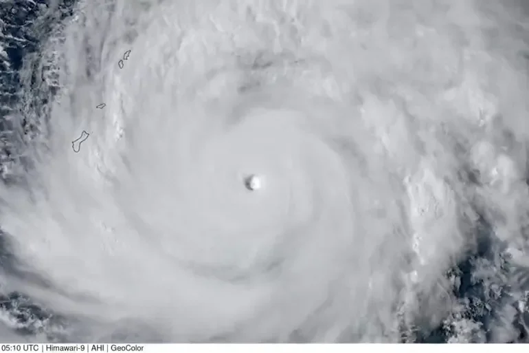 A satellite image of Super Typhoon Sinlaku approaching the Mariana Islands and Guam over the Pacific Ocean, on April 13, 2026.