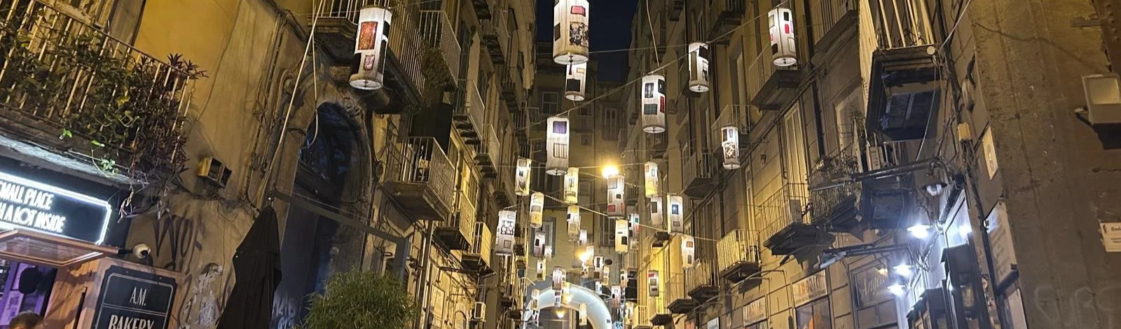 Whimsical hanging lanterns made of cozy, patterned fabrics, creating a warm and welcoming ambiance.