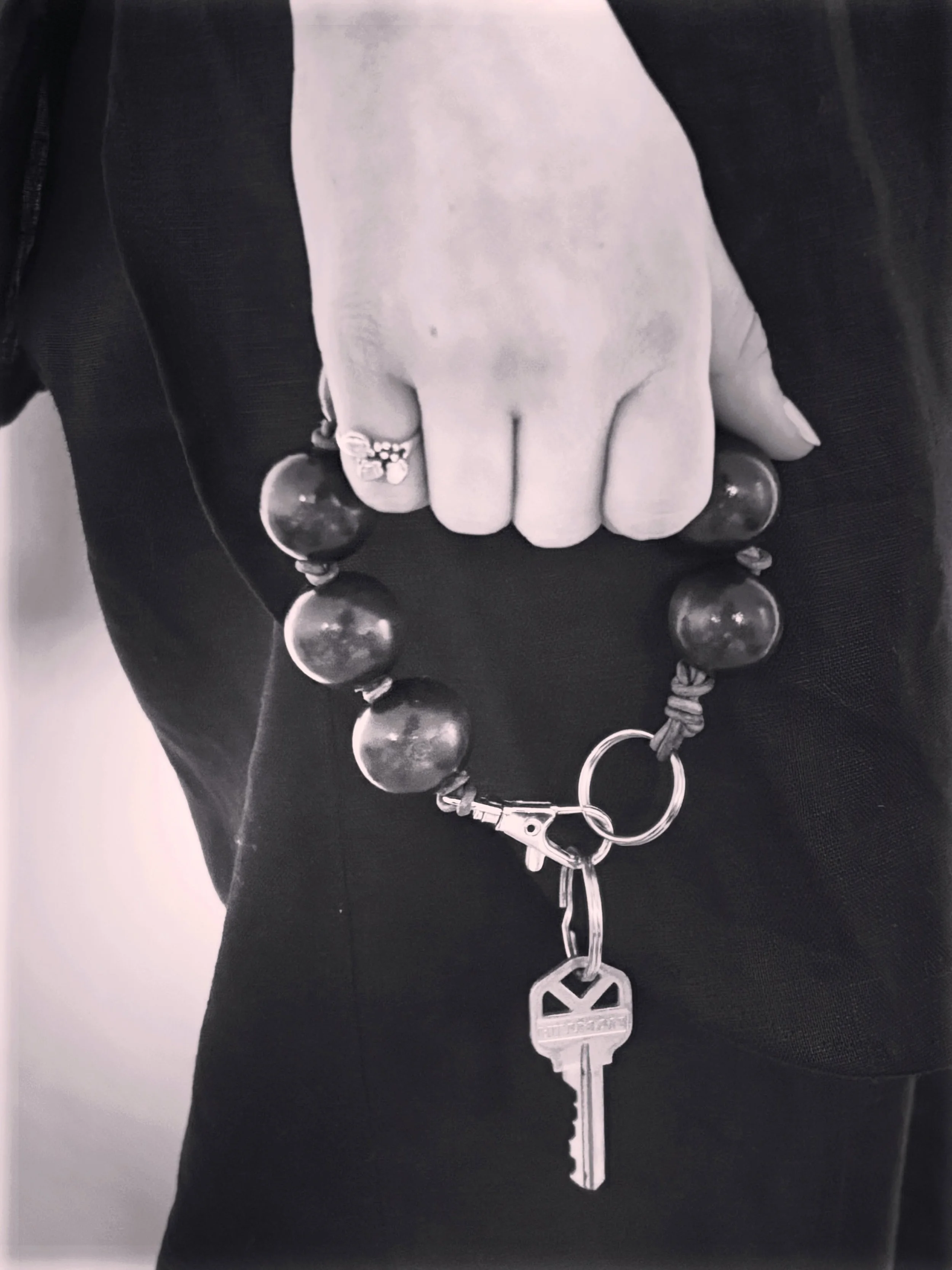 The BIG keychain. 

25mm wood beads hand knotted on 2 mm leather, finished with key ring and lobster clasp. 

Clips perfectly on a bag, or wear it on your wrist and save fumbling for your keys at the door. Worst case, it&rsquo;s easy to find if it&rs