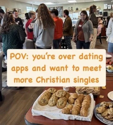 A group of people gathered in a room, with a table of baked goods in the foreground. A text overlay reads, "POV: you're over dating apps and want to meet more Christian singles."