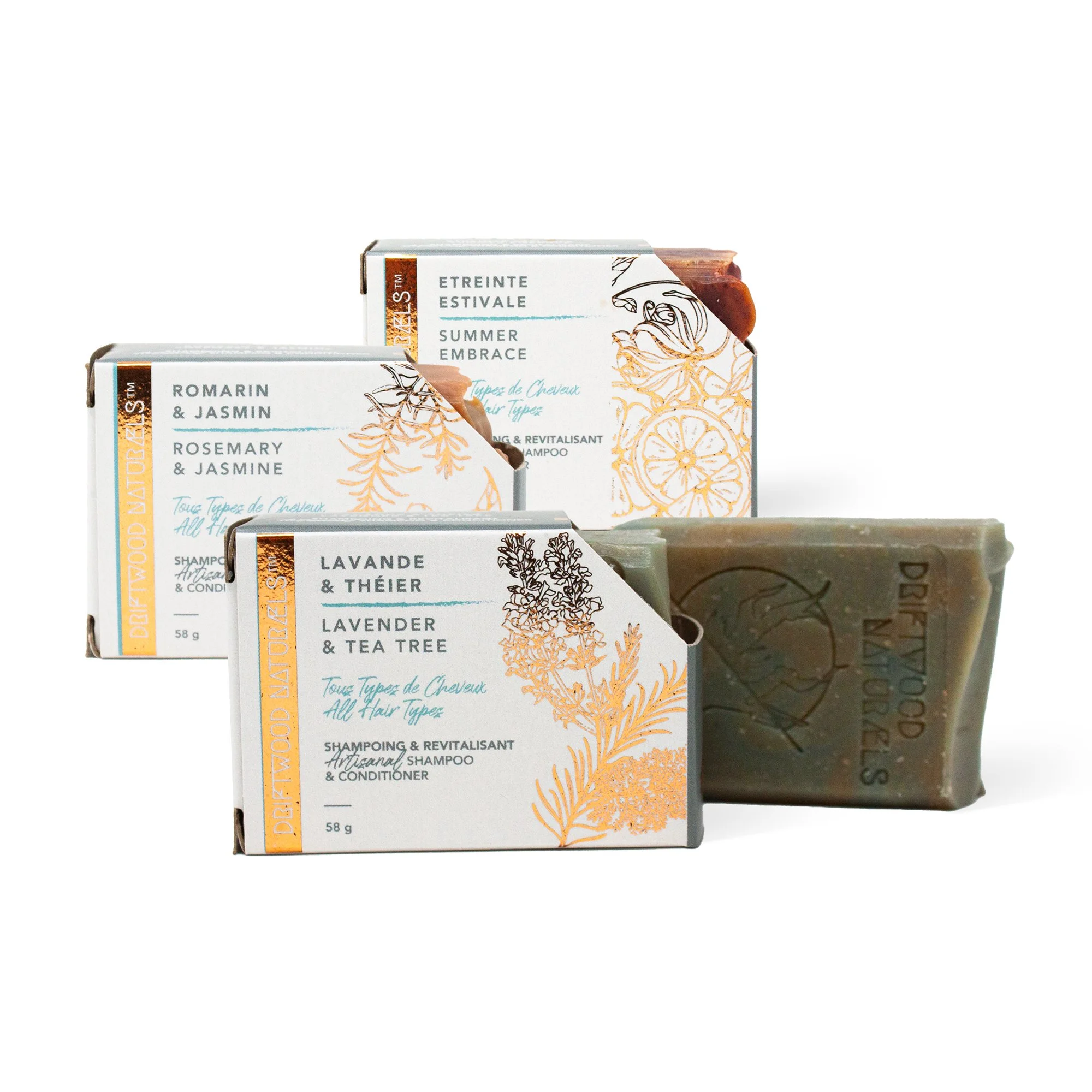 Boîte de shampooing naturel avec illustrations d'agrumes et d'herbes, labels en français et anglais, produits de soin capillaire bio.