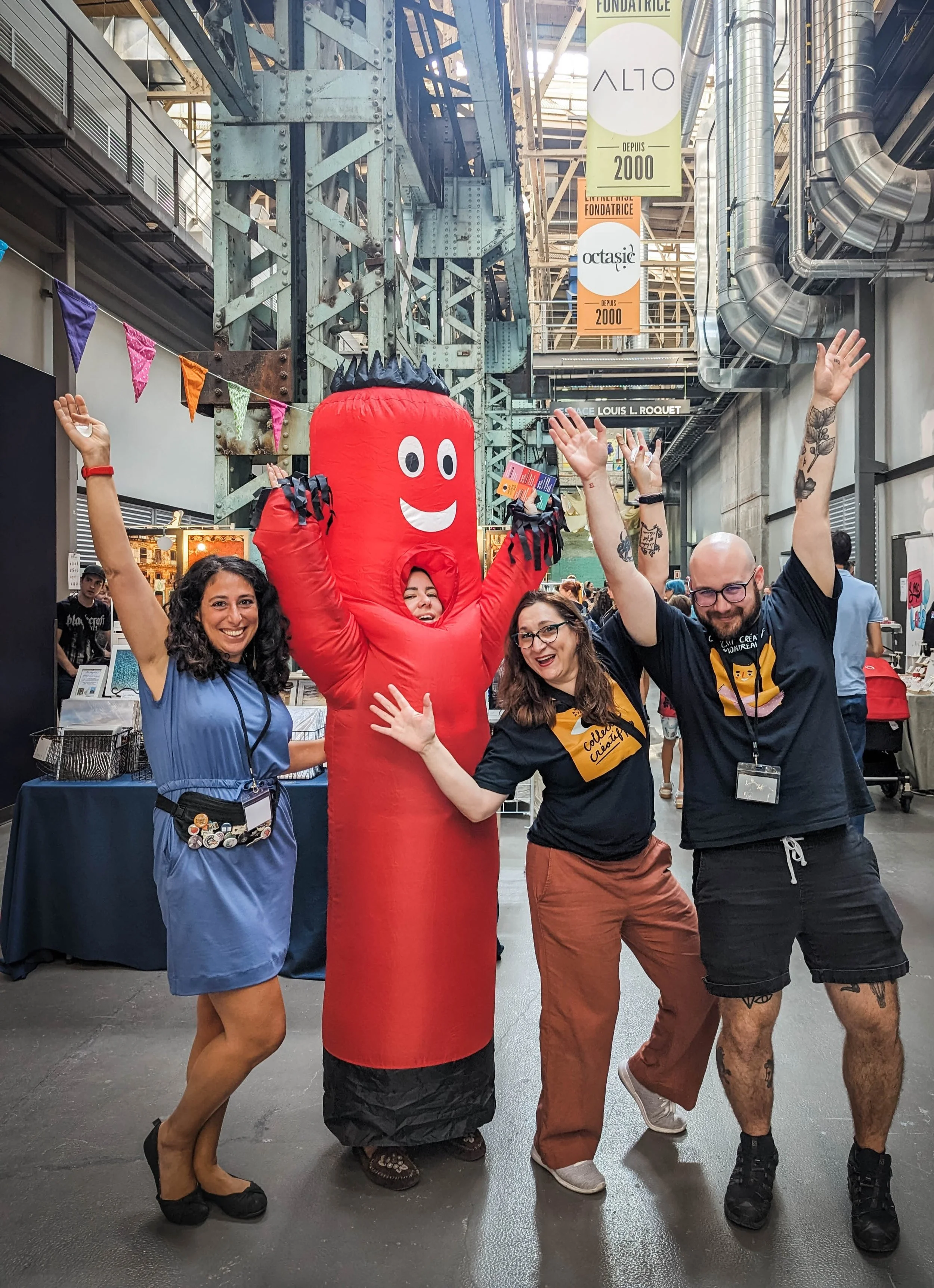 Collectif Creatif MTL team and red tube guy mascot