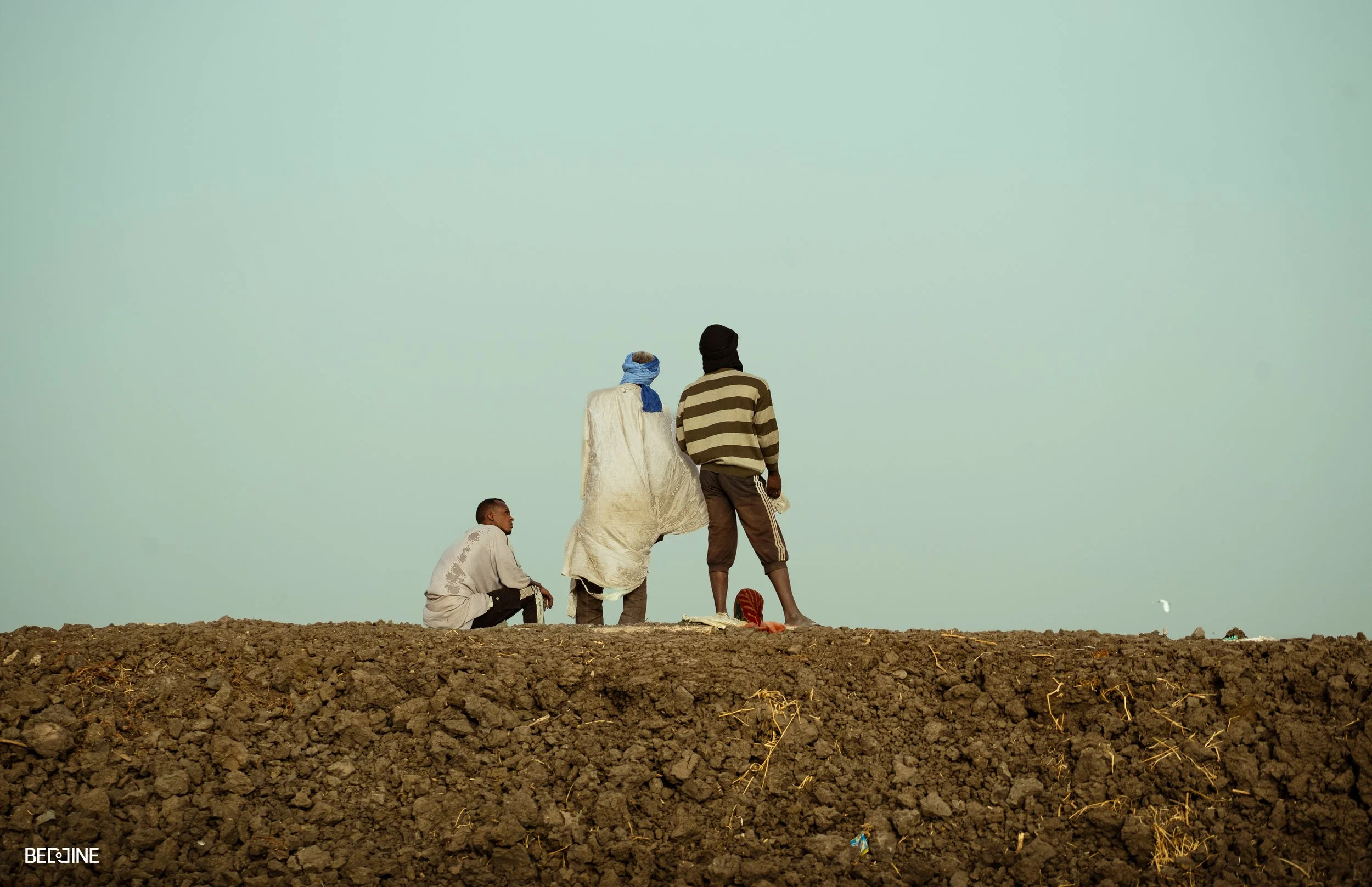 farmers on rkiz field hill from back (1 of 1).jpg