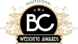Logo for BC Wedding Awards, featuring a black circle with white letters 'BC', surrounded by ornate gold decorative elements, and the text 'Wedding Awards' at the bottom.