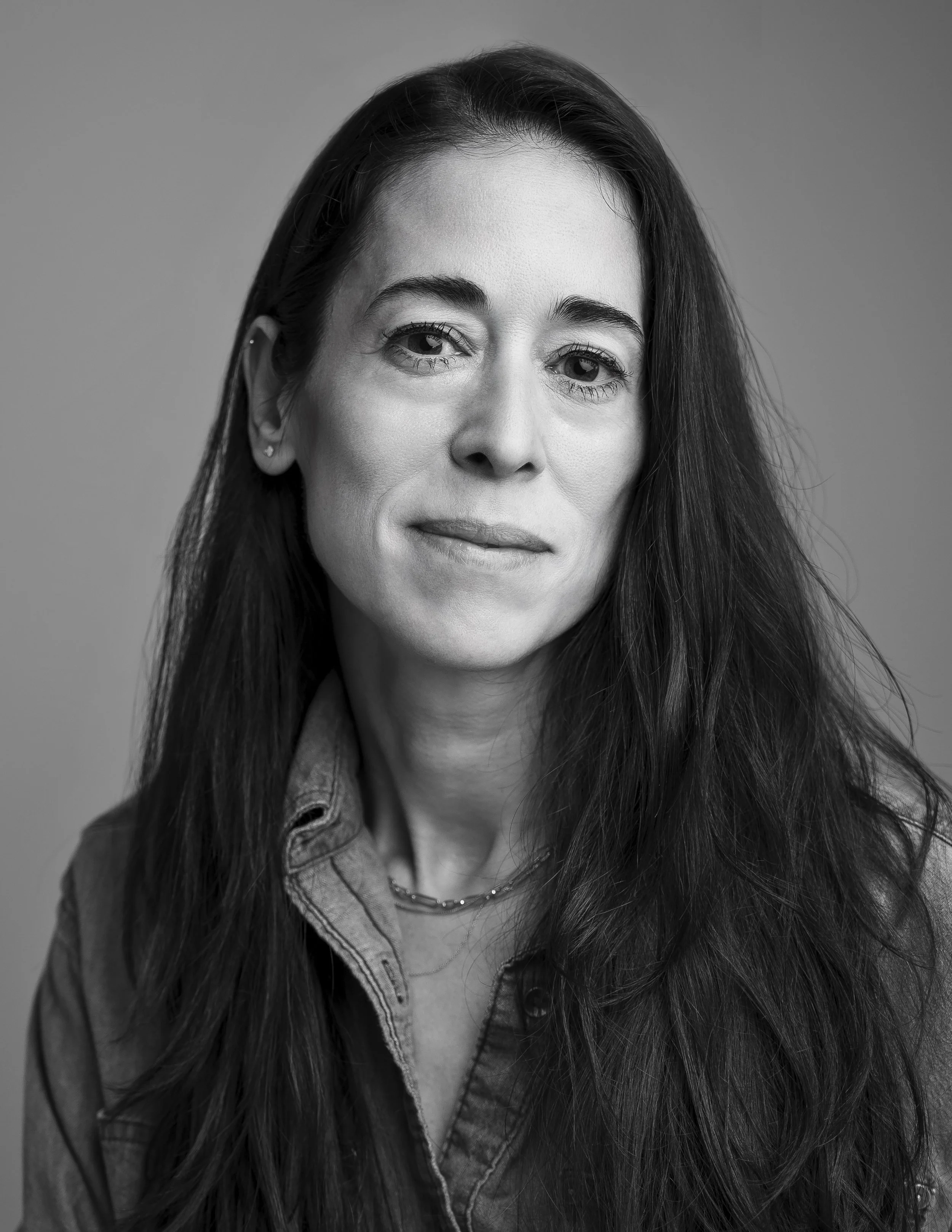 Black and white portrait of Victoria Wellman - a speechwriter, narrative strategist and author.