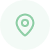A solid light green circle on a white background.