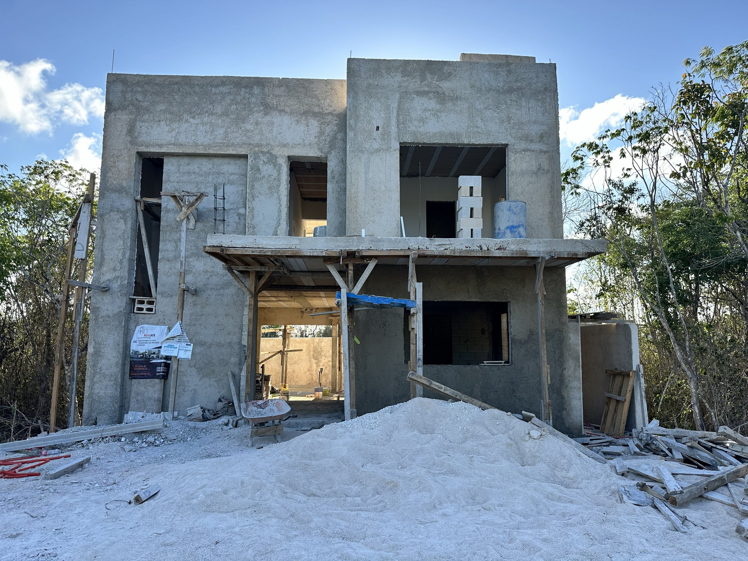 Gray stucco coat applied to the exterior walls