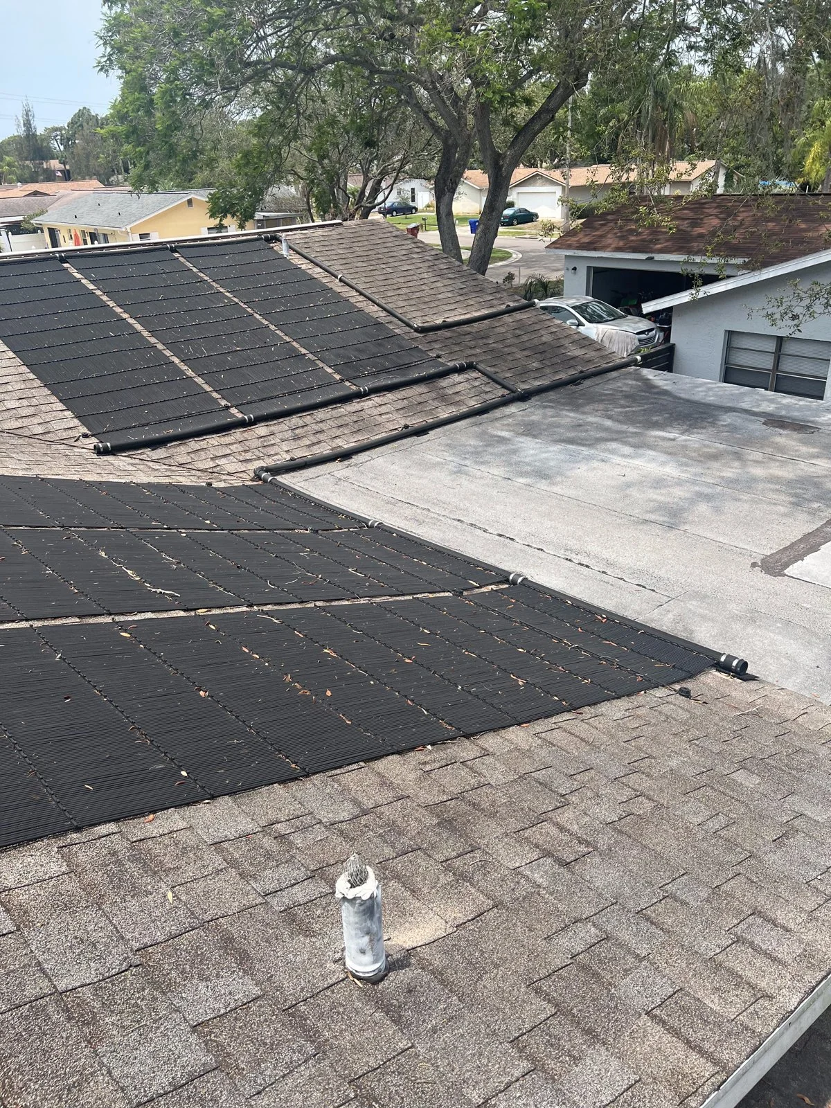 11_solar-roof-with-paver-driveway.jpg