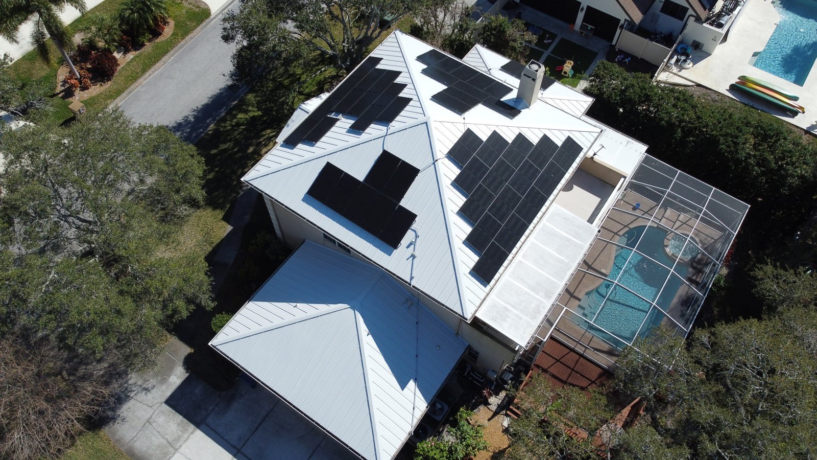 12_solar-metal-roof-with-pool_aerial.jpg