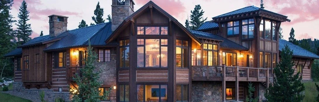 High-end mountain home with expansive windows in Evergreen, Colorado.
