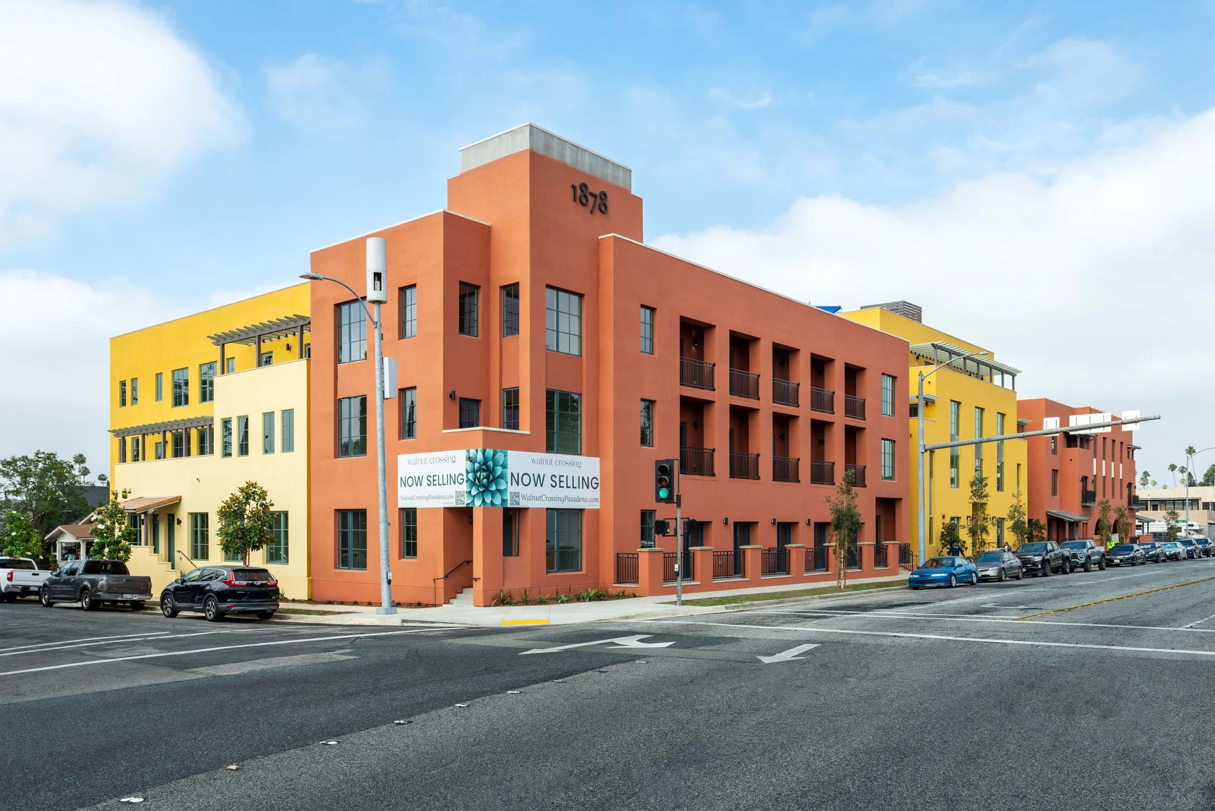 Exterior view of Walnut Crossing Pasadena condominiums and townhomes at 1878 E Walnut St in Pasadena, CA