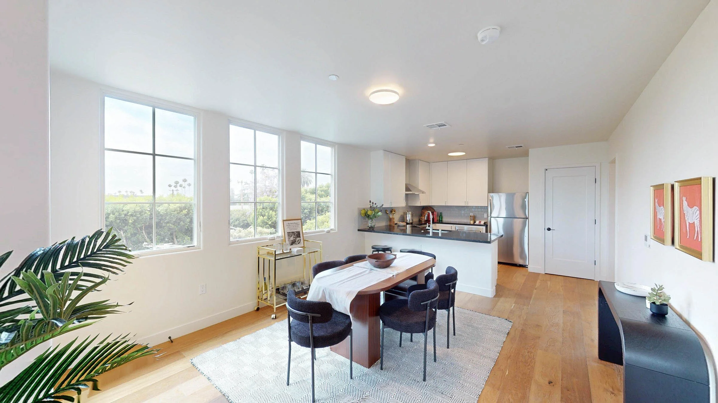 Open-concept dining and kitchen space at Walnut Crossing Pasadena
