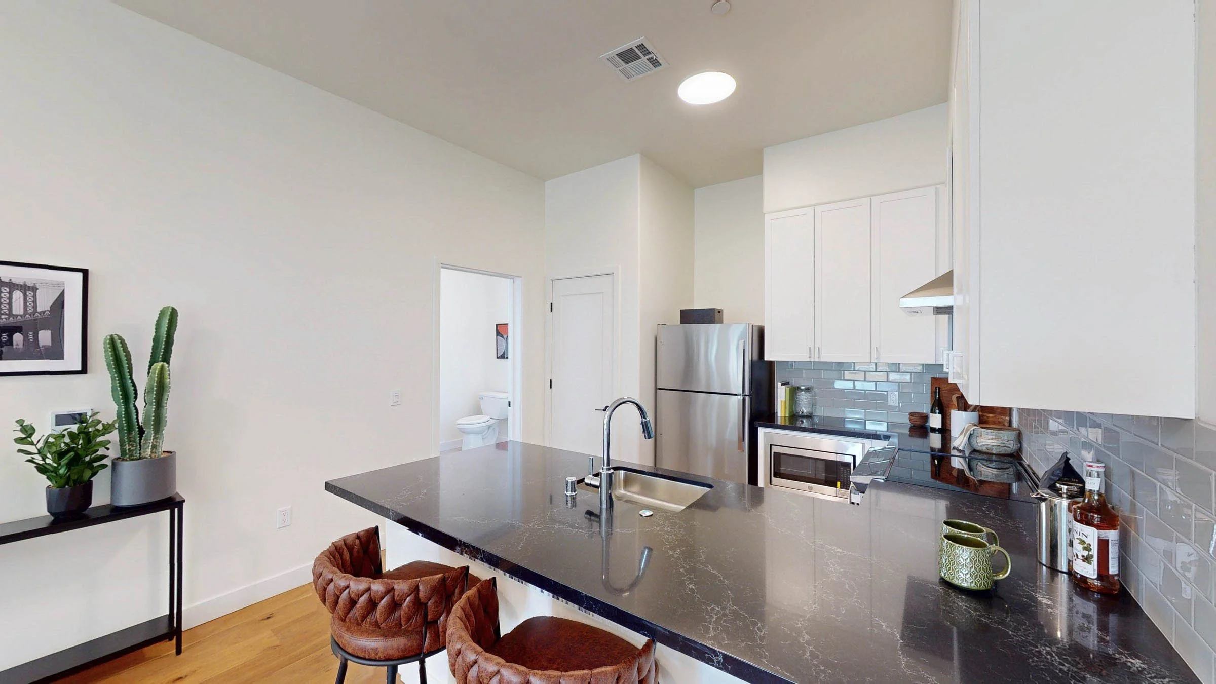 Kitchen with island seating at Walnut Crossing Pasadena