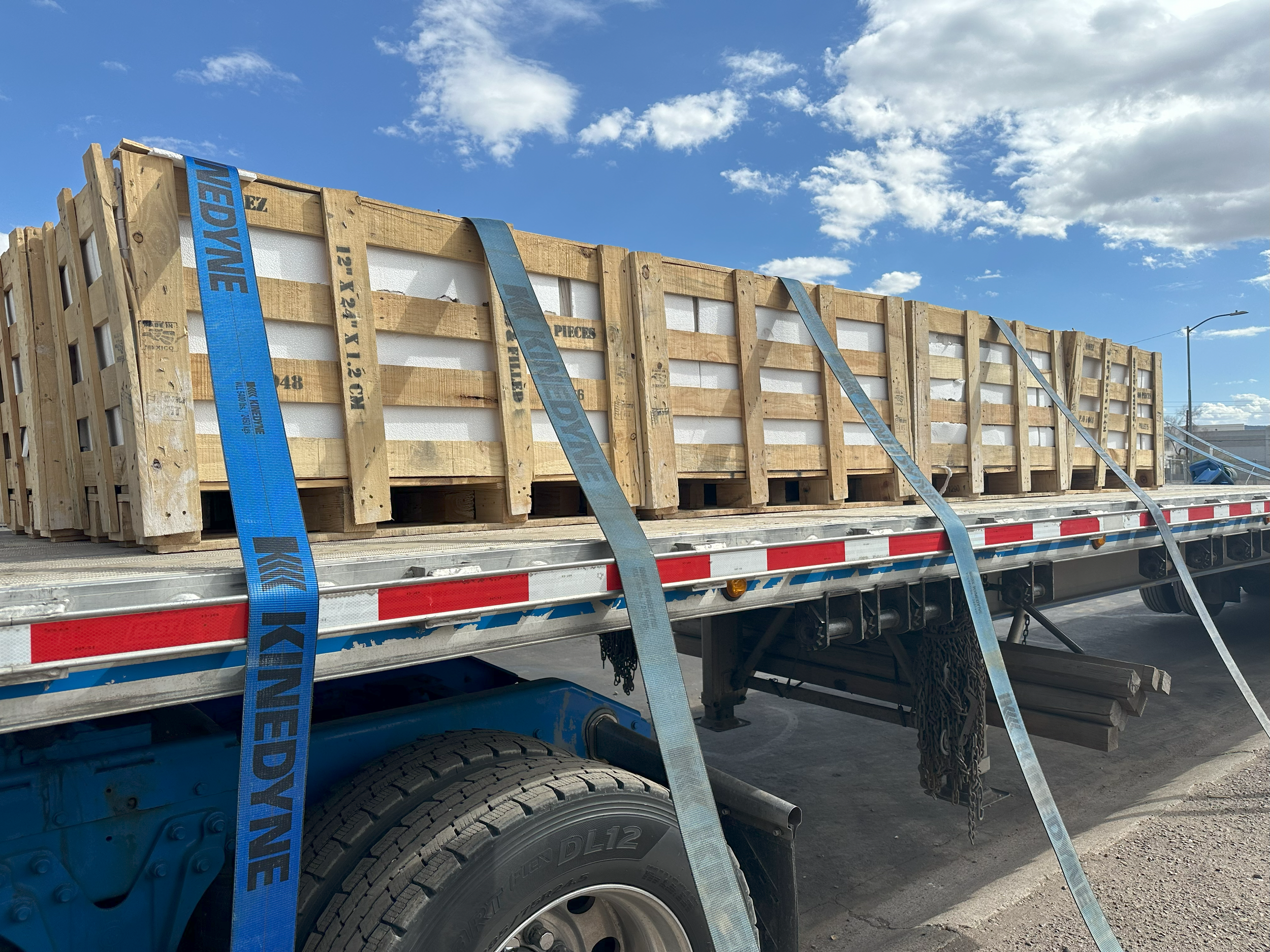Oranssi technician working on a roof project